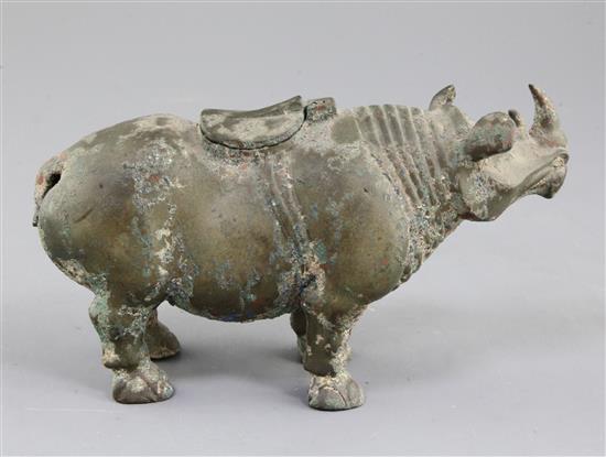 A rare Chinese archaic bronze ritual rhinoceros wine vessel, Zun, early Western Han dynasty, 206 B.C. - 9 A.D. 11.8cm high, 21cm long